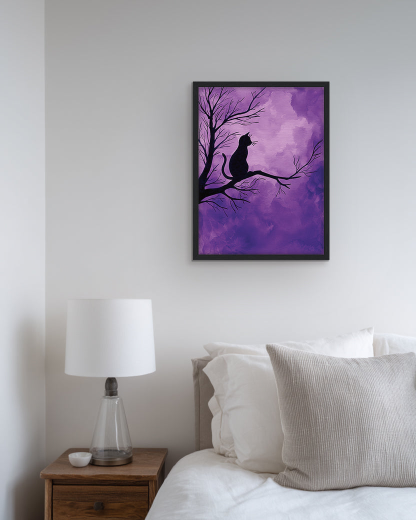 Silhouette of a cat on a leafless tree branch against a purple twilight sky