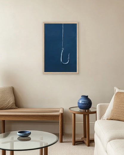 Wall art of a fishing hook on a dark blue ocean background
