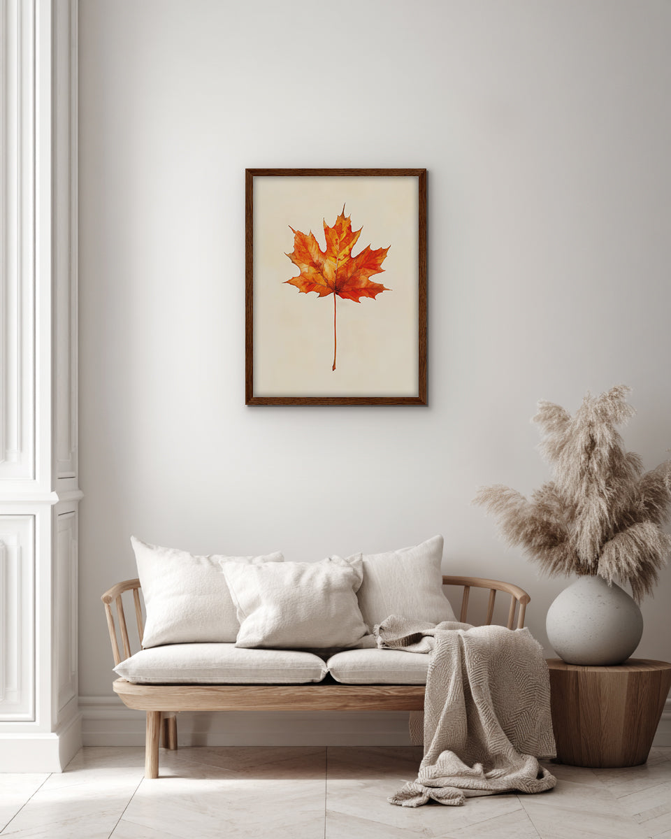 Wall art of an autumnal maple leaf on a beige background