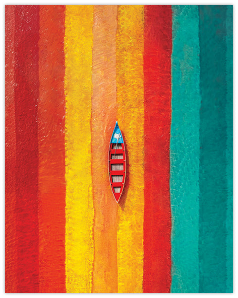 Wall art with colorful striped sea with a small boat in the center
